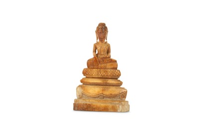 Lot 700 - A THAI IVORY CARVING OF A SAKYAMUNI BUDDHA....