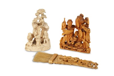 Lot 701 - TWO CHINESE IVORY CARVINGS AND AN IVORY BRUSH....