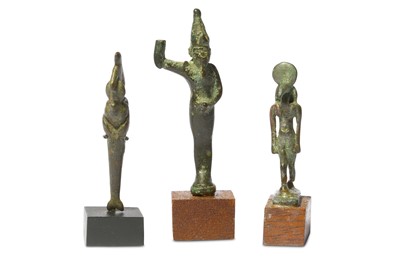 Lot 33 - A GROUP OF EGYPTIAN BRONZE FIGURES Late Period,...