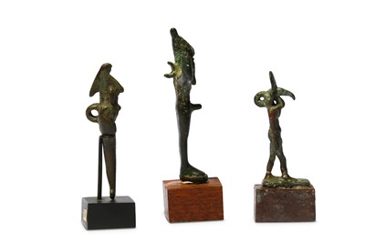Lot 33 - A GROUP OF EGYPTIAN BRONZE FIGURES Late Period,...