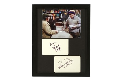 Lot 160 - The Two Ronnies.- Album pages signed by the...