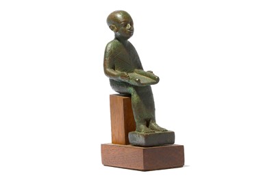 Lot 62 - AN EGYPTIAN BRONZE FIGURE OF IMHOTEP Late...