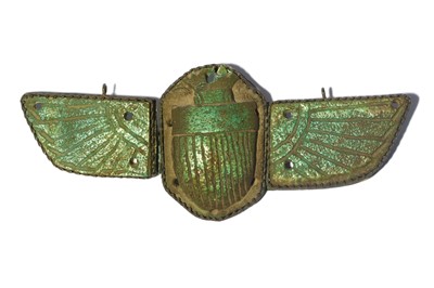 Lot 44 - AN EGYPTIAN GLAZED COMPOSITION WINGED SCARAB...