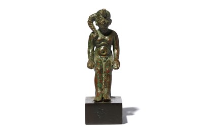Lot 63 - AN EGYPTIAN BRONZE FIGURE OF SEATED...