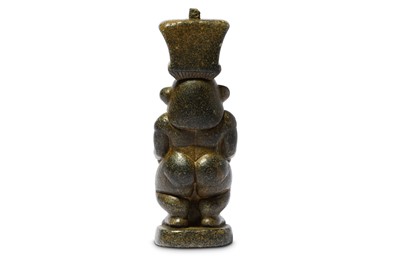 Lot 65 - AN EGYPTIAN SERPENTINE FIGURE OF BES Late...
