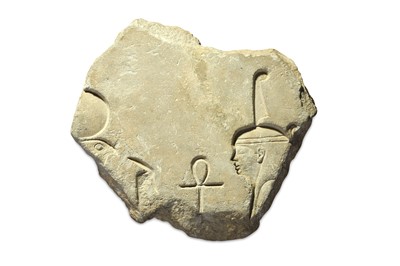 Lot 55 - AN EGYPTIAN LIMESTONE RELIEF FRAGMENT Late...