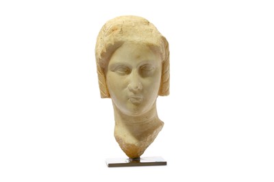 Lot 122 - A PTOLEMAIC MARBLE HEAD OF A WOMAN Circa 332 -...