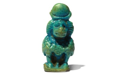 Lot 16 - AN EGYPTIAN GLAZED COMPOSITION BABOON AMULET...