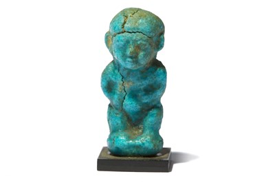 Lot 15 - AN EGYPTIAN GLAZED COMPOSITION PATAIKOS AMULET...