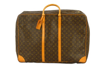 Lot 415 - Louis Vuitton Monogram Sirius 65, c. 1995,...