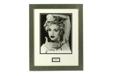 Lot 228 - Madonna & Britney Spears Attractive black and...