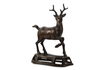 Lot 854 - A CHINESE BRONZE MODEL OF A DEER. 17th Century....