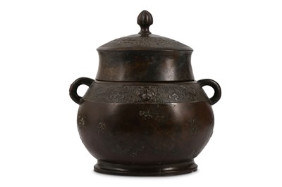 Lot 855 - A CHINESE BRONZE ARCHAISTIC VESSEL AND COVER....