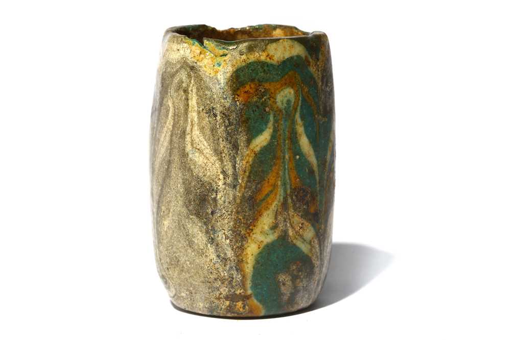 Lot 168 - AN EGYPTIAN FRAGMENTARY CORE-FORMED GLASS...