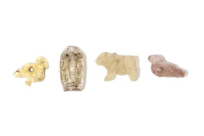 Lot 199 - FOUR NEAR EASTERN HARDSTONE AND SHELL AMULETS...
