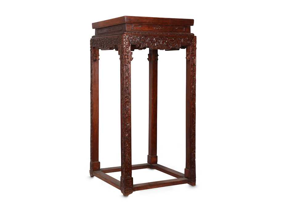 Lot 620 - A CHINESE WOOD STAND. Qing Dynasty. With a...