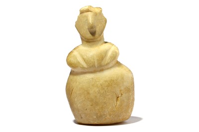 Lot 196 - A STEATOPYGOUS MARBLE IDOL Possibly Neolithic,...