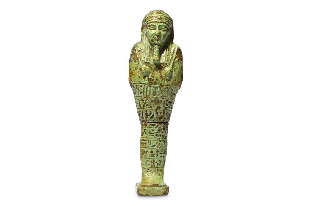 Lot 166 - AN EGYPTIAN GLAZED COMPOSITION SHABTI FOR ANKH-...