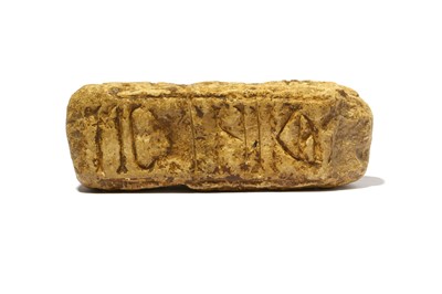 Lot 204 - A STONE CARVING The rectangular prism stone...