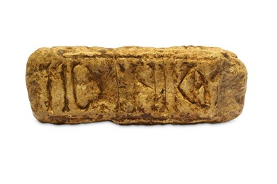 Lot 204 - A STONE CARVING The rectangular prism stone...