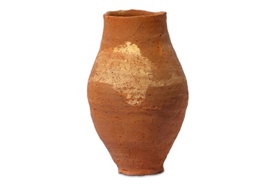 Lot 162 - AN EGYPTIAN POTTERY JAR The rounded body...