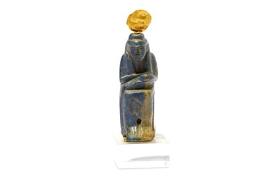 Lot 189 - AN EGYPTIAN LAPIS LAZULI AMULET OF SEATED ISIS...