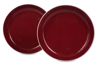 Lot 761 - A PAIR OF CHINESE RUBY-GLAZED DISHES. Qing...