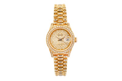 Lot 337 - ROLEX. A LADIES 18K YELLOW GOLD AND...