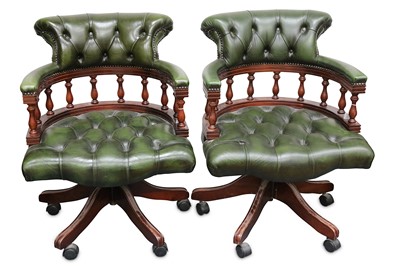 Lot 357 - A pair of Captains chairs, upholstered in...