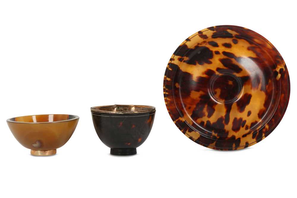 Lot 665 - A CHINESE TORTOISE SHELL CUP AND STAND. Qing
