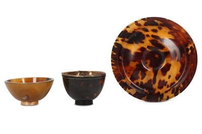 Lot 665 - A CHINESE TORTOISE SHELL CUP AND STAND. Qing...