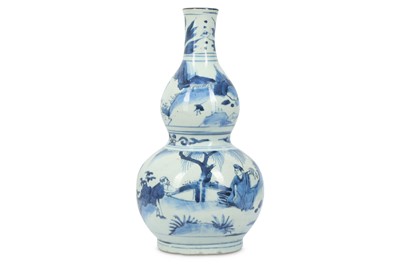 Lot 575 - A CHINESE BLUE AND WHITE DOUBLE GOURD VASE....