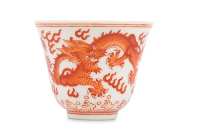 Lot 146 - A CHINESE IRON-RED ‘DRAGON’ WINE CUP. Qing...