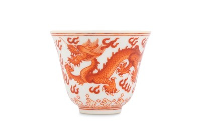 Lot 146 - A CHINESE IRON-RED ‘DRAGON’ WINE CUP. Qing...