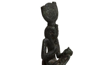 Lot 23 - AN EGYPTIAN BRONZE FIGURE OF ISIS AND HORUS...