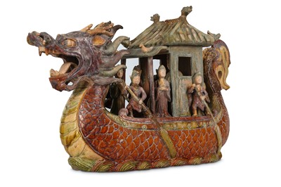 Lot 554 - A CHINESE GLAZED POTTERY MODEL OF A DRAGON...