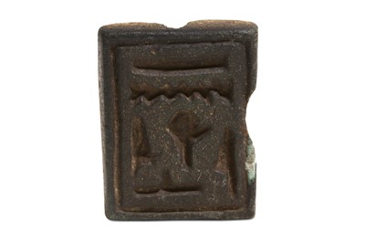 Lot 38 - AN EGYPTIAN GREEN GLAZED COMPOSITION AMULET ...