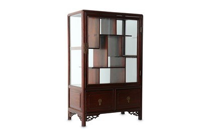 Lot 453 - A CHINESE DISPLAY CABINET. Qing Dynasty. With...