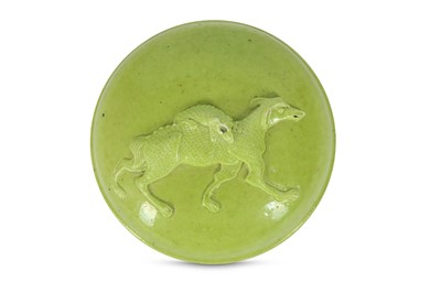 Lot 769 - A CHINESE LIME GREEN-GLAZED BISCUIT SEAL PASTE...