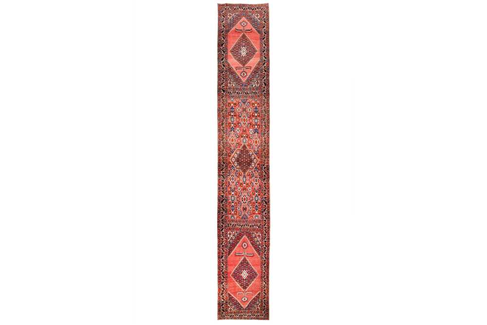 Lot 27 - AN ANTIQUE NORTH-WEST PERSIAN RUNNER...