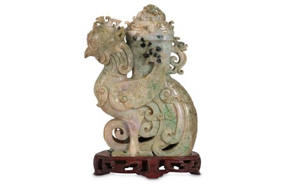 Lot 675 - A CHINESE JADEITE ARCHAISTIC 'PHOENIX' VASE...