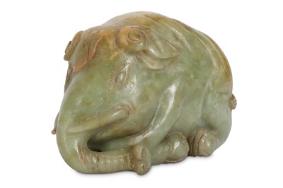 Lot 677 - A CHINESE CELADON JADE 'ELEPHANT' CARVING. The...