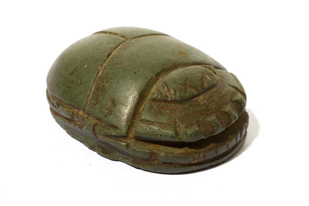 Lot 178 - AN EGYPTIAN SCHIST HEART SCARAB Third...
