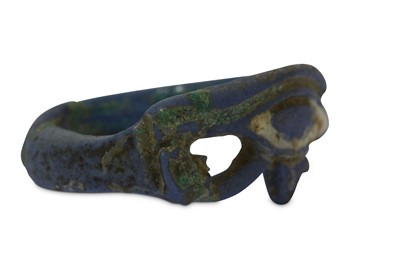 Lot 174 - AN EGYPTIAN GLAZED COMPOSITION UDJAT EYE RING...