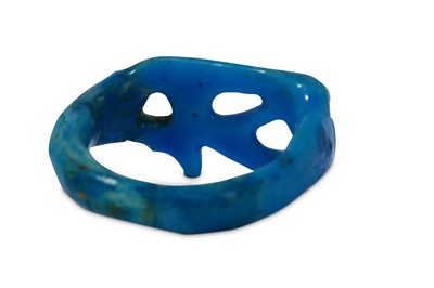 Lot 173 - AN EGYPTIAN GLAZED COMPOSITION UDJAT EYE RING...