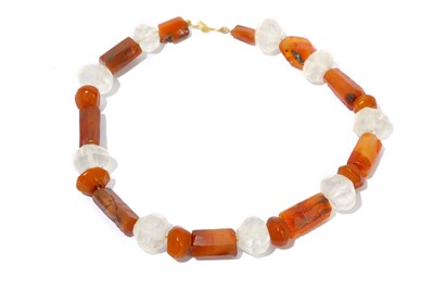 Lot 198 - A GROUP OF ROCK CRYSTAL AND CARNELIAN BEADS...