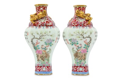 Lot 185 - A PAIR OF CHINESE FAMILLE ROSE BALUSTER VASES....