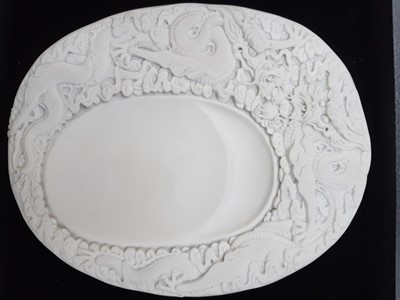 Lot 6 - A CHINESE WHITE BISCUIT 'DRAGON' INKSTONE.