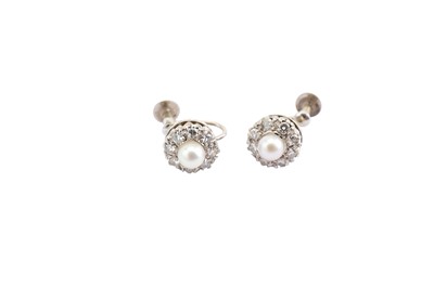 Lot 50 - A pair of cultured pearl and diamond cluster...