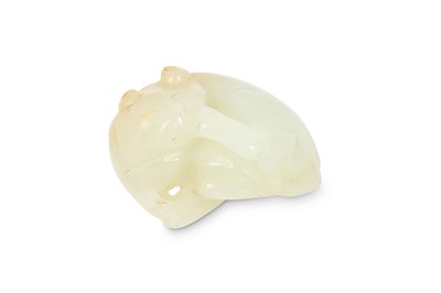 Lot 895 - A CHINESE WHITE JADE CARVING OF A CAT. Qing...